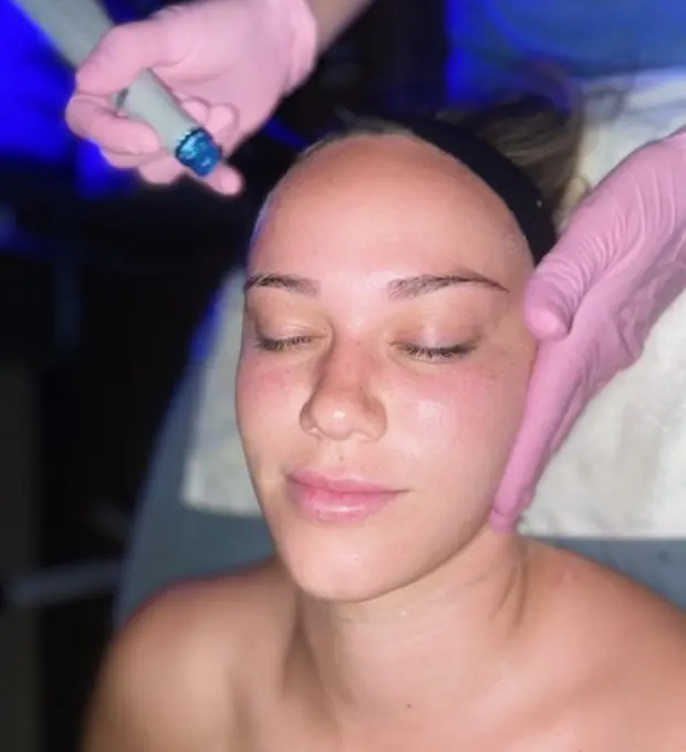 woman getting a facial treatment