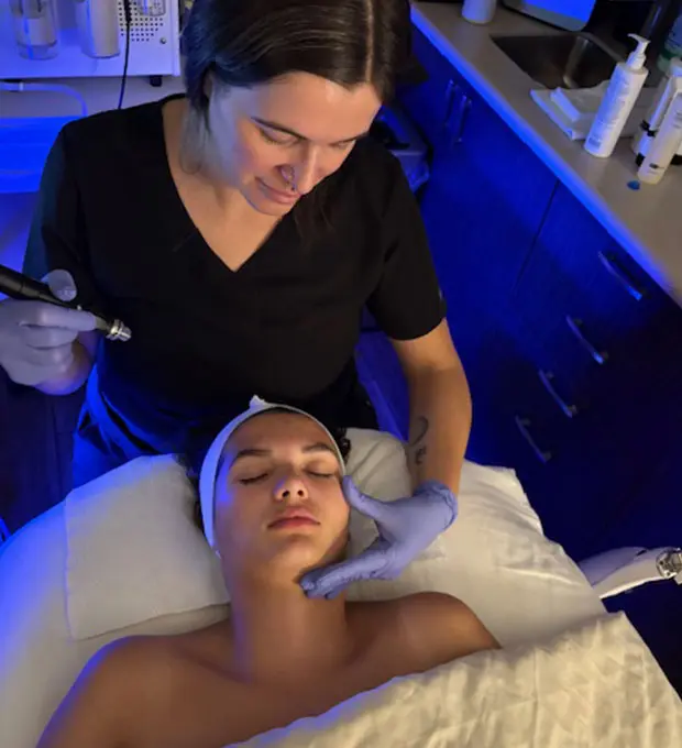 woman getting a facial treatment