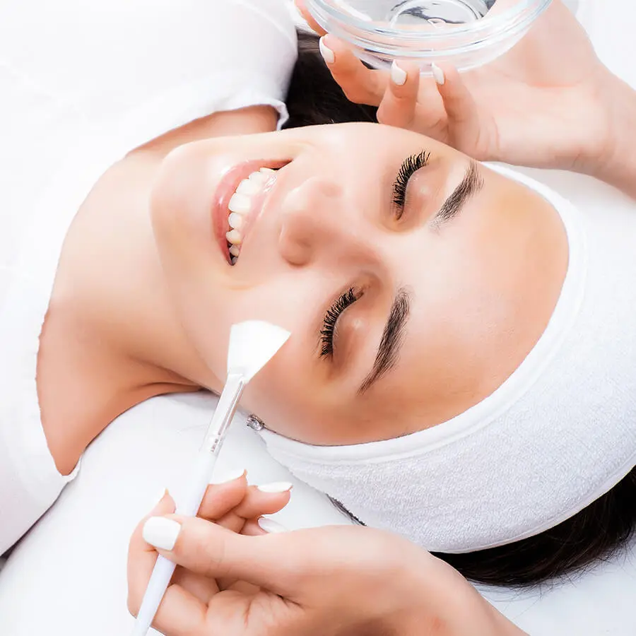 female patient getting facial treatment