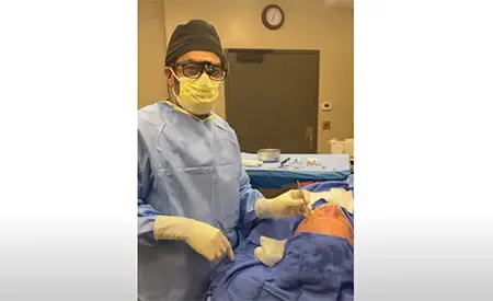 Dr. Mabourakh describing his technique during an eyelid surgical procedure