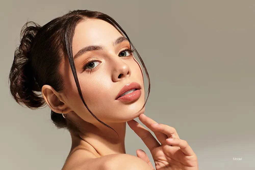 Young woman with her hair in a bun